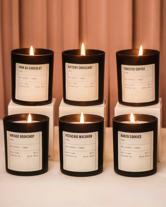 Set of bestselling candles with labels on a neutral background