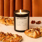 Maple pecan danish candle with pastries and nuts on a table