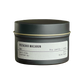 Candle tin labeled 'Pistachio Macaron' on a white background