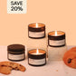 Candle set with 'SAVE 20%' label on a peach background