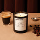 Roasted coffee candle with a glass of coffee on a brown surface