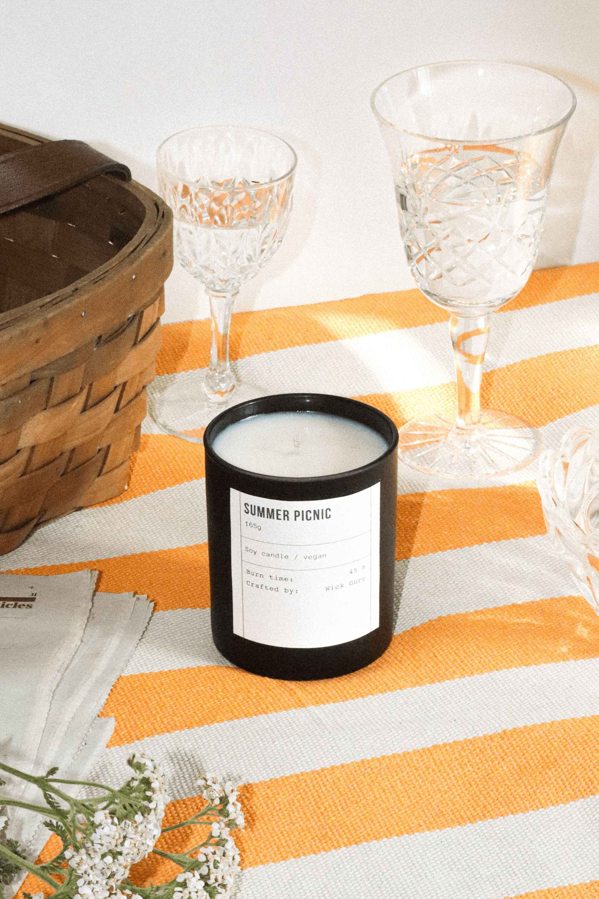 Summer Picnic Candle - Enjoy the outdoors with our soy candle set amidst a charming picnic scene.